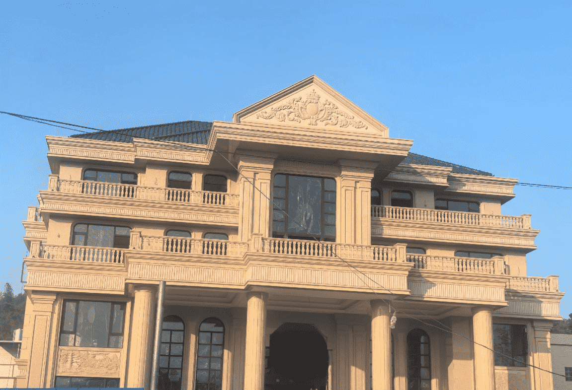 鞍山黄金麻别墅外墙干挂石材效果示例